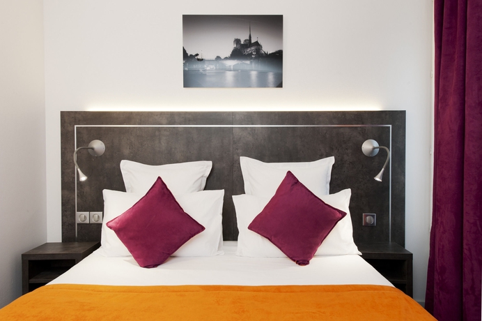 Imagen de la habitación del Hotel du Plat d'Etain. Foto 8