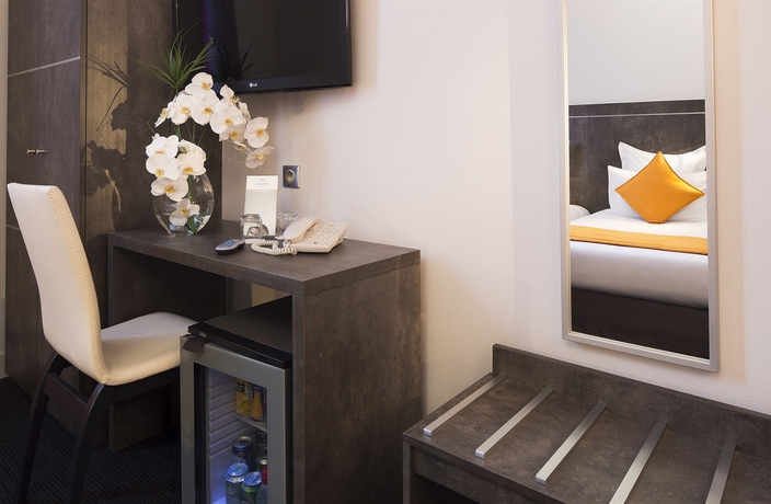 Imagen de la habitación del Hotel du Plat d'Etain. Foto 9