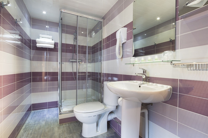 Imagen de la habitación del Hotel du Plat d'Etain. Foto 11