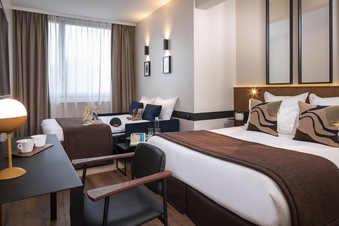 Imagen de la habitación del Hotel du Port, NOGENT SUR MARNE. Foto 9