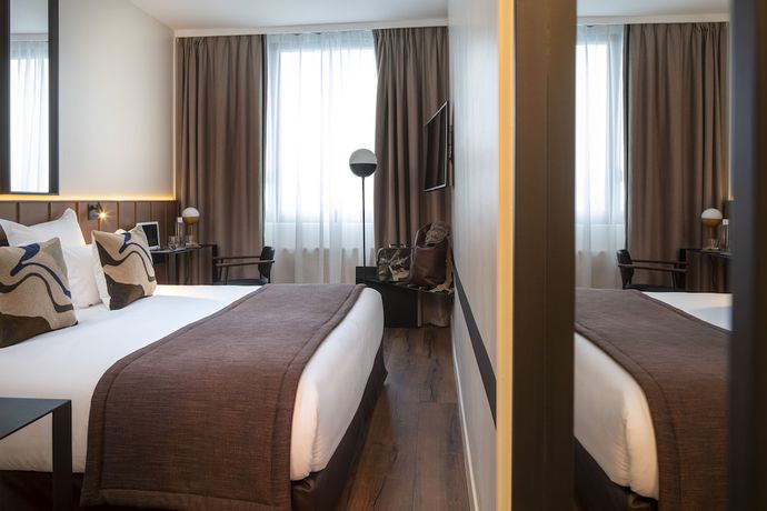 Imagen de la habitación del Hotel du Port, NOGENT SUR MARNE. Foto 15