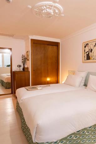 Imagen de la habitación del Hotel du Temps Madrid. Foto 7