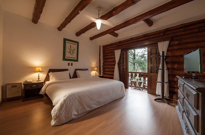 Imagen de la habitación del Hotel e Fazenda Rosa dos Ventos. Foto 10