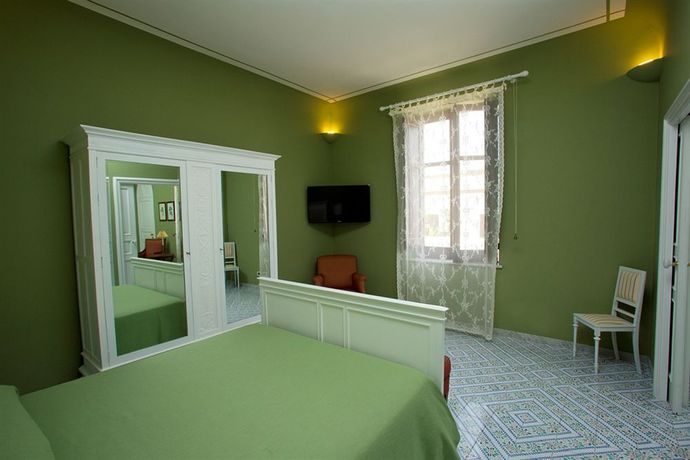 Imagen de la habitación del Hotel e Resort Villa Favorita. Foto 3