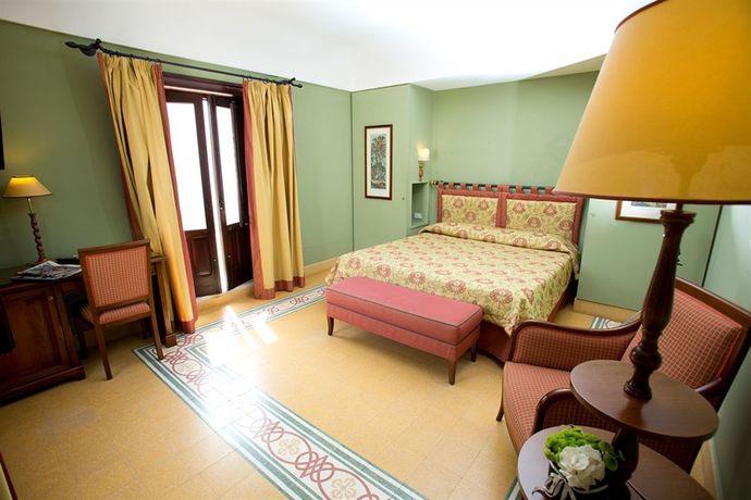 Imagen de la habitación del Hotel e Resort Villa Favorita. Foto 5