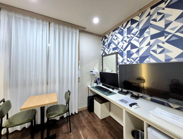 Imagen de la habitación del Hotel e motel. Foto 7