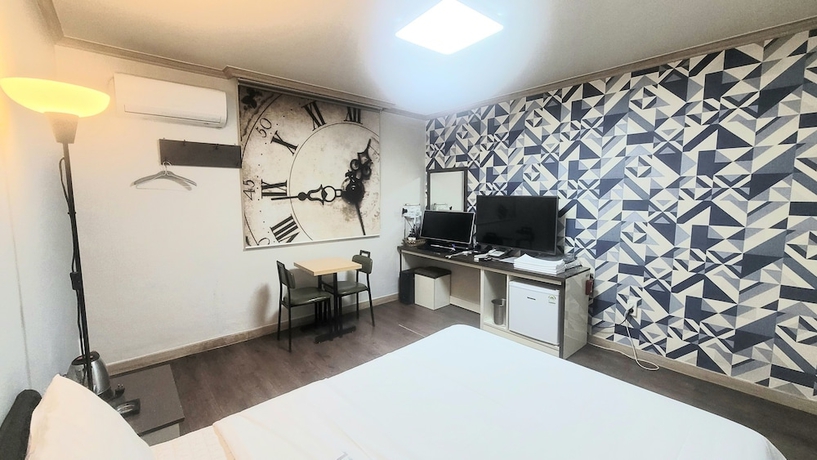 Imagen de la habitación del Hotel e motel. Foto 9