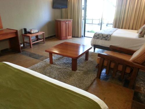 Imagen de la habitación del Hotel eBundu Lodge. Foto 7