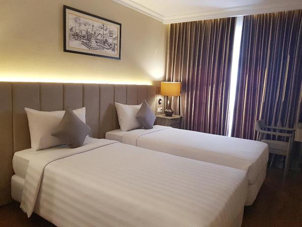 Imagen de la habitación del Hotel eL Hotel Yogyakarta Malioboro. Foto 4