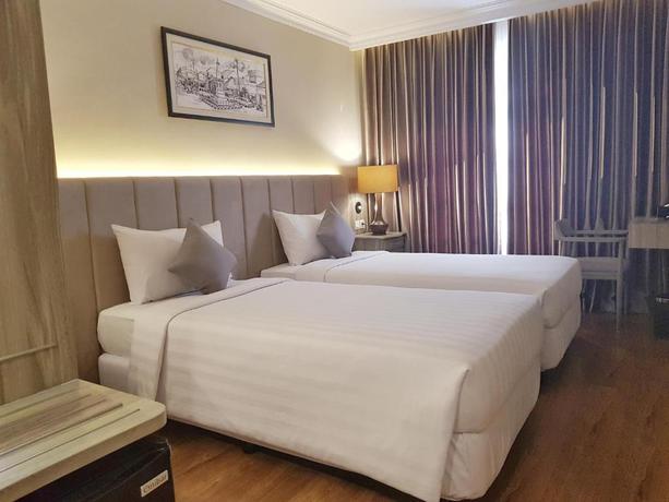 Imagen de la habitación del Hotel eL Hotel Yogyakarta Malioboro. Foto 10