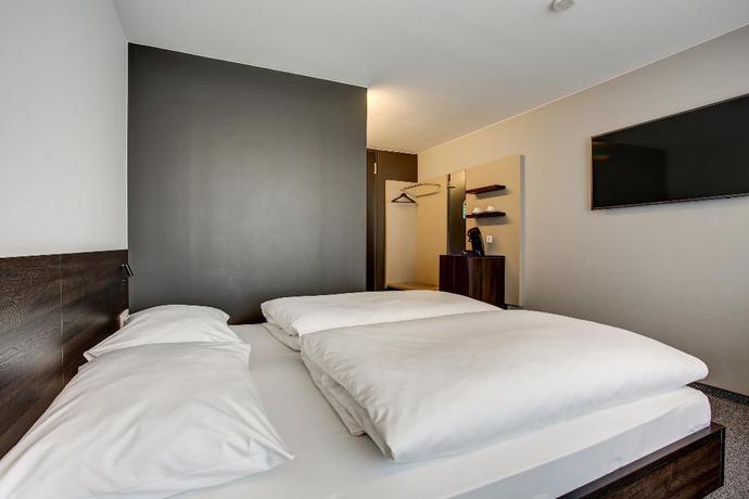 Imagen de la habitación del Hotel eXo Fly Level 4 Stuttgart-Flughafen. Foto 13