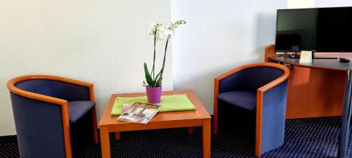 Imagen de la habitación del Hotel eXo Square Heidelberg/Schwetzingen - by SuperFlys. Foto 19