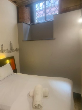 Imagen de la habitación del Hotel easyHotel Manchester. Foto 8