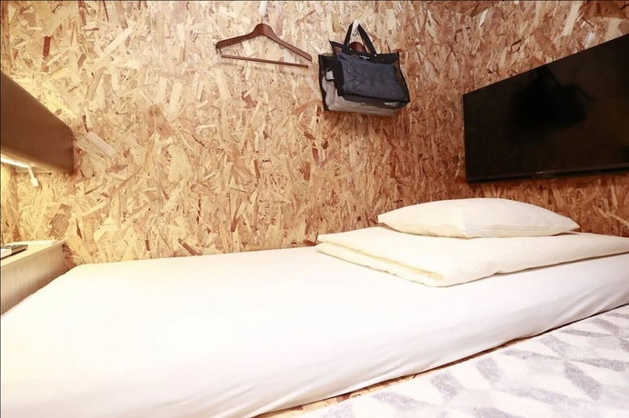 Imagen de la habitación del Hotel eeGee STAY Omiya. Foto 12