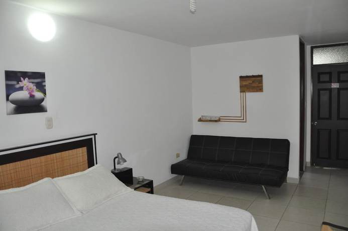 Imagen de la habitación del Hotel el Meson de las Flores. Foto 7