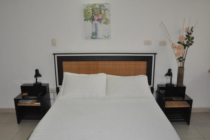 Imagen de la habitación del Hotel el Meson de las Flores. Foto 8