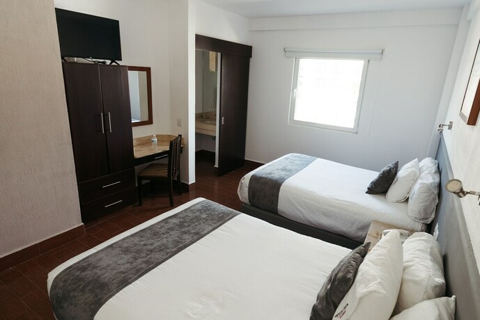 Imagen de la habitación del Hotel es Unico Express. Foto 18