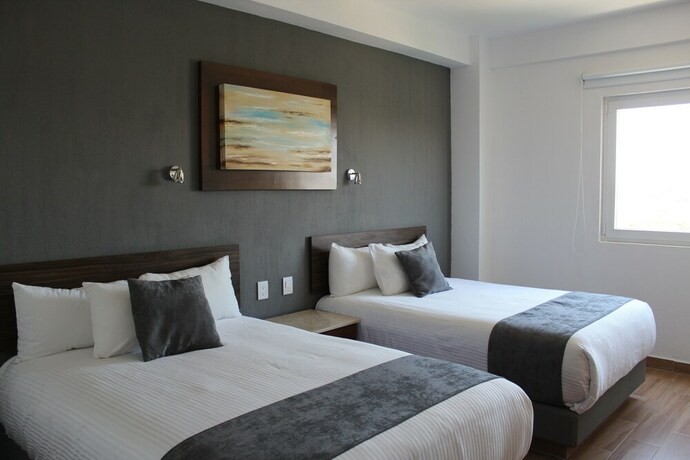 Imagen de la habitación del Hotel es Unico Express. Foto 22
