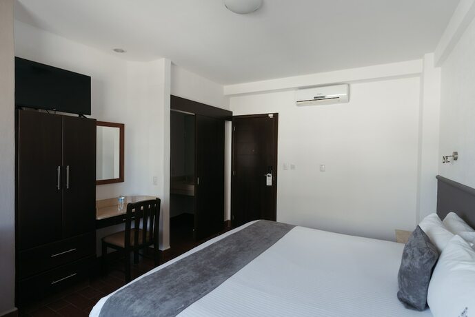 Imagen de la habitación del Hotel es Unico Express. Foto 23