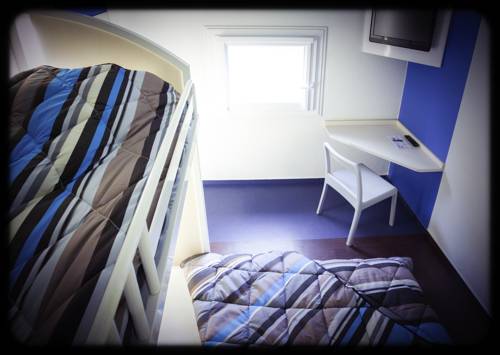 Imagen de la habitación del Hotel f1 &Eacute;vry A6. Foto 12