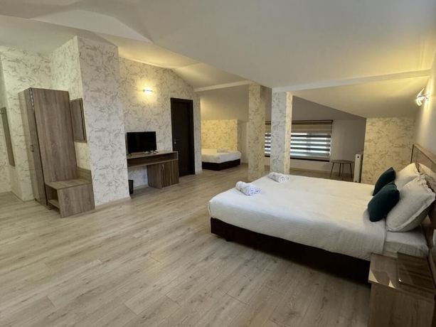 Imagen de la habitación del Hotel family hotel BONJOUR. Foto 3