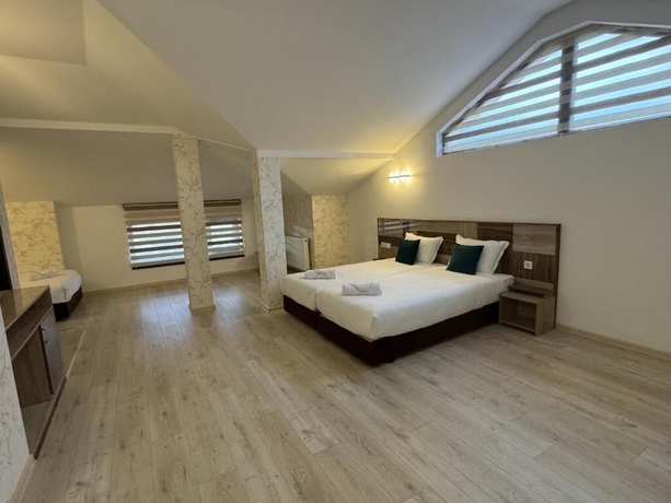 Imagen de la habitación del Hotel family hotel BONJOUR. Foto 4
