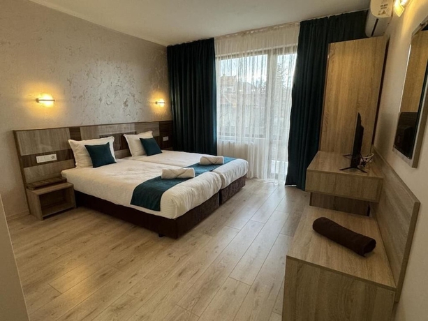 Imagen de la habitación del Hotel family hotel BONJOUR. Foto 5