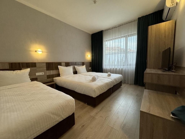 Imagen de la habitación del Hotel family hotel BONJOUR. Foto 7