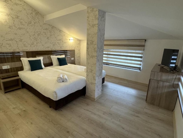 Imagen de la habitación del Hotel family hotel BONJOUR. Foto 8