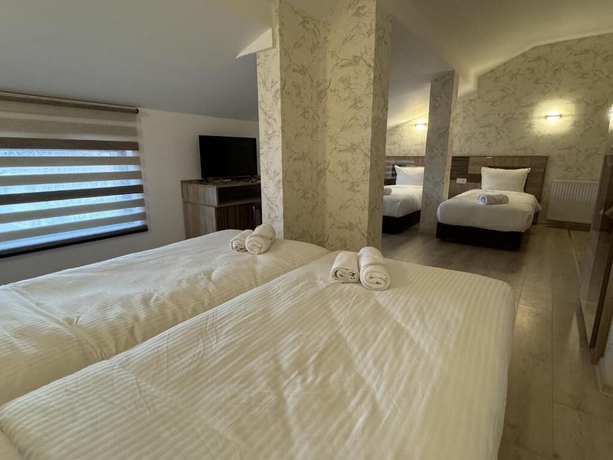 Imagen de la habitación del Hotel family hotel BONJOUR. Foto 10