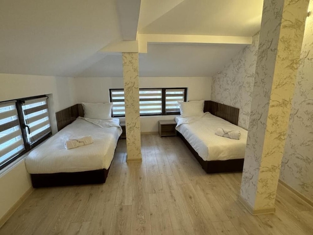 Imagen de la habitación del Hotel family hotel BONJOUR. Foto 14