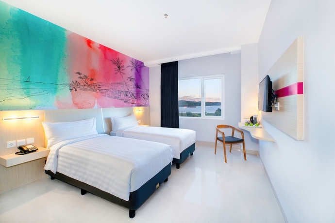 Imagen de la habitación del Hotel favehotel Bitung. Foto 4
