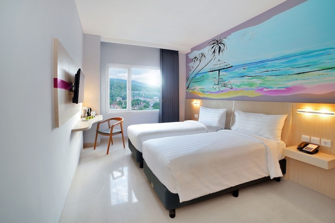 Imagen de la habitación del Hotel favehotel Bitung. Foto 6