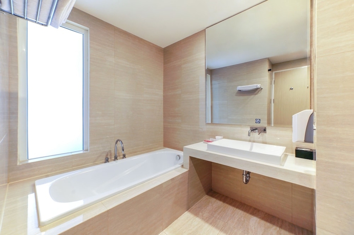 Imagen de la habitación del Hotel favehotel Bitung. Foto 8