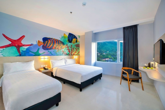 Imagen de la habitación del Hotel favehotel Bitung. Foto 9