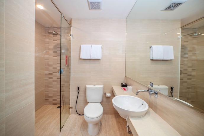 Imagen de la habitación del Hotel favehotel Bitung. Foto 10
