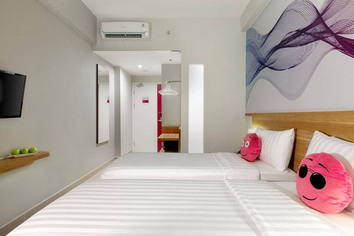 Imagen de la habitación del Hotel favehotel Karawang. Foto 14