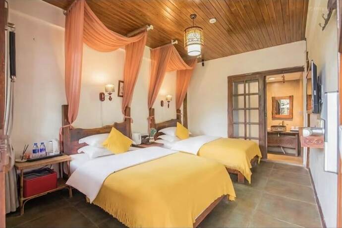 Imagen de la habitación del Hotel fenghelijiang. Foto 7