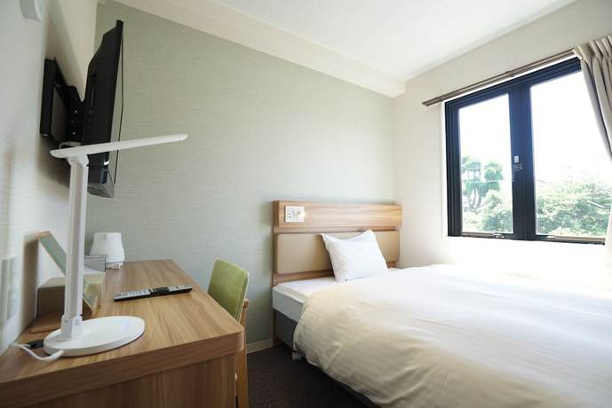 Imagen de la habitación del Hotel fico HIJI. Foto 8