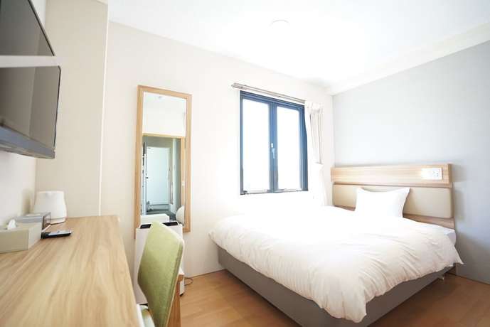 Imagen de la habitación del Hotel fico HIJI. Foto 13