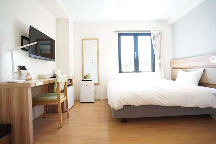 Imagen de la habitación del Hotel fico HIJI. Foto 15