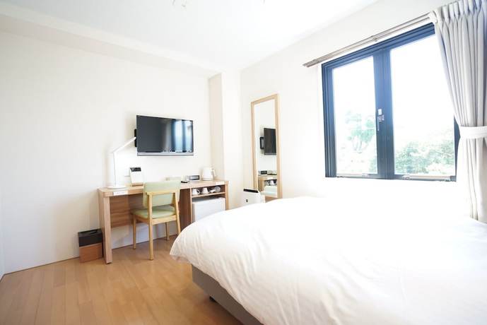 Imagen de la habitación del Hotel fico HIJI. Foto 16