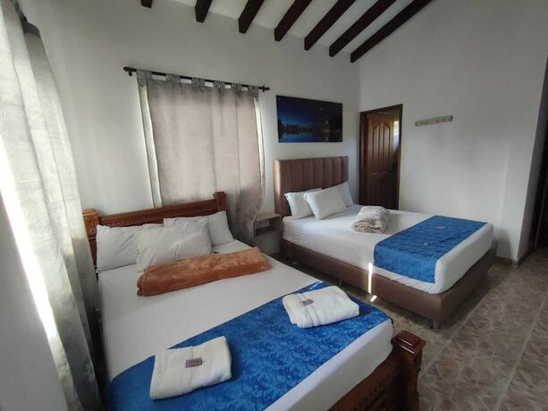 Imagen de la habitación del Hotel finca hotel zona franca. Foto 19