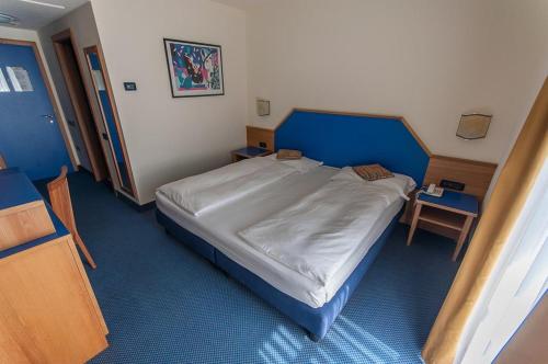 Imagen de la habitación del Hotel garni Meledrio. Foto 16