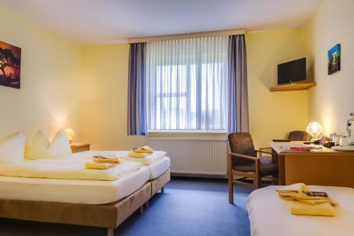 Imagen de la habitación del Hotel garni Zwickau-Mosel. Foto 6