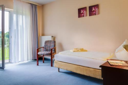 Imagen de la habitación del Hotel garni Zwickau-Mosel. Foto 7