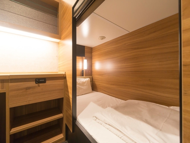 Imagen de la habitación del Hotel global cabin Tokyo Suidobashi, Bunkyo-Ku. Foto 3