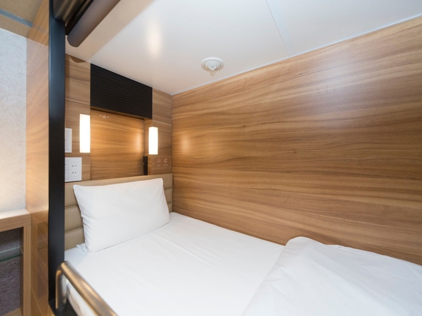 Imagen de la habitación del Hotel global cabin Tokyo Suidobashi, Bunkyo-Ku. Foto 5