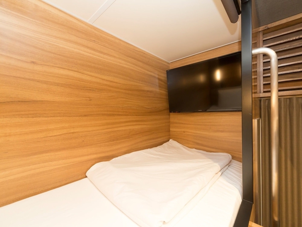 Imagen de la habitación del Hotel global cabin Tokyo Suidobashi, Bunkyo-Ku. Foto 11