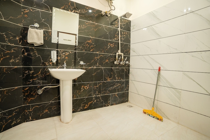 Imagen de la habitación del Hotel goSTOPS Amritsar Chatiwind Gate. Foto 10